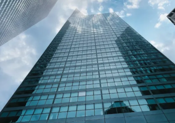 Photograph of a skyscraper, representing the companies ambition.